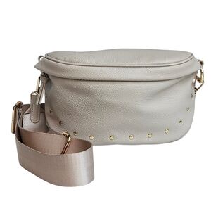 Elegant Cream Leather Bag with Gold Accents